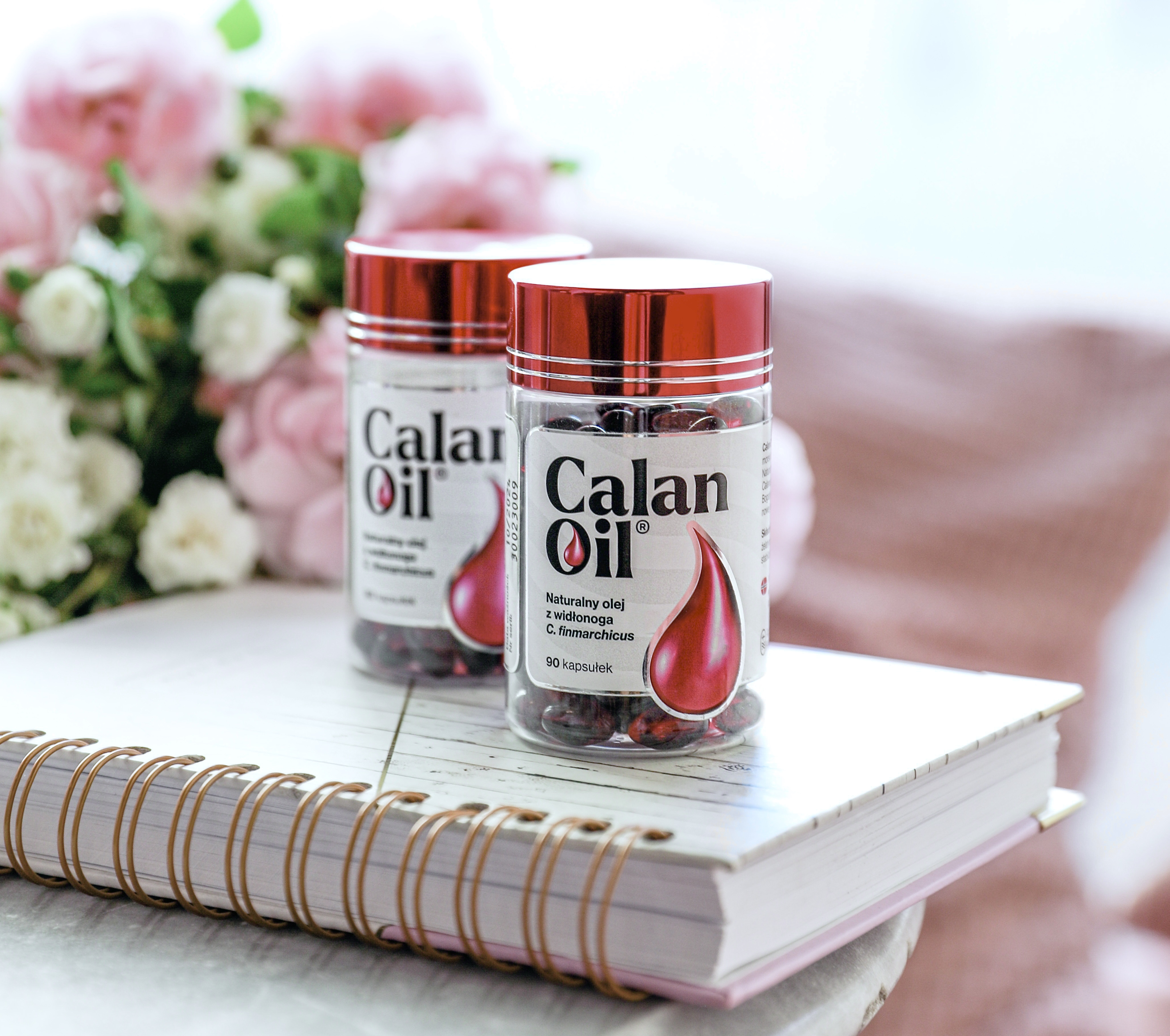 dwa opakowania suplementu diety CalanOil zawierajcego kwasy omega 3